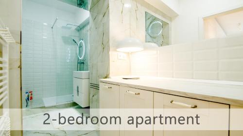 Old Town Apartment | White Apartments with AC by Kovee