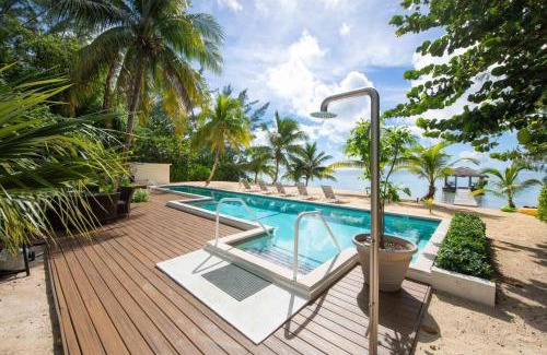 Breakers House | White Cottage by Grand Cayman Villas & Condos