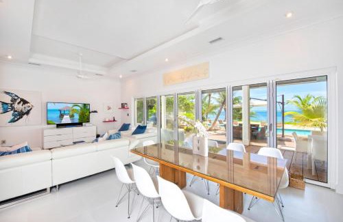 Breakers House | White Cottage by Grand Cayman Villas & Condos