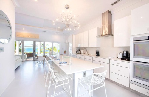 Breakers House | White Cottage by Grand Cayman Villas & Condos