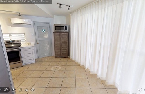 The Bight House | White House beachfront villa at Coral Gardens snorkeling reef
