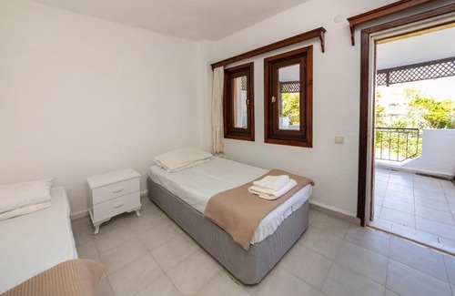 Dagbelen House | White House with Mediterranean Sea View near Camel Beach in Bodrum