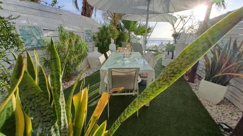 Trois-Bassins Apartment | White Sunset - Votre appartement pieds dans l'eau