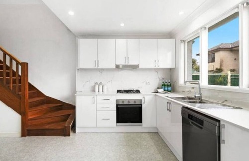 Earlwood House | Whole House with city views .
