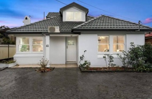 Earlwood House | Whole House with city views .