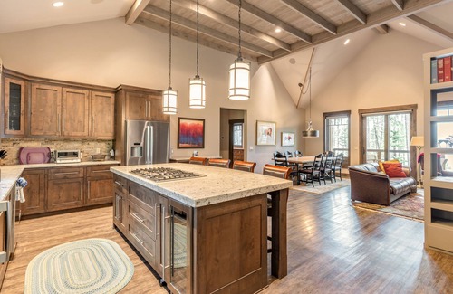 Lakeside House | Wilderness retreat with a large deck, grill, updated interior, fireplace, and AC
