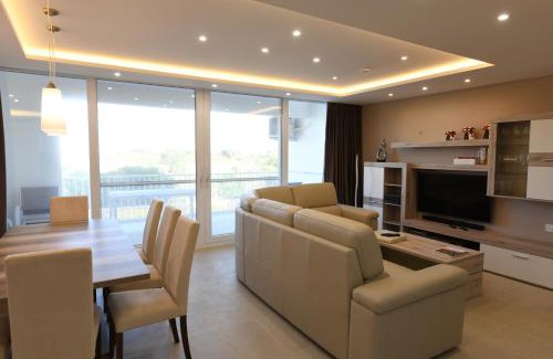 Qala Apartment | Wileg 4B Luxury Two Bedroom Apartment with Shared Swimming Pool.