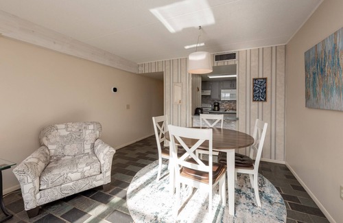 Thayerville Condo | Will O' The Wisp 304C: Lakefront One Bedroom Condo with Fireplace & Balcony!