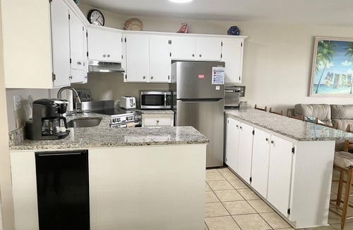 Holden Beach House | "Wine Down"-Oceanfront Duplex-4 Bedroom/3 Bathrooms and Swim Spa seats 9 people