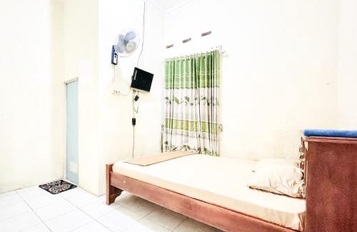 Tumpang Hotel | Wisma Air Mancur Malang Mitra RedDoorz