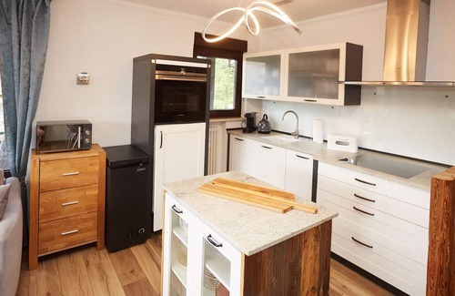 Verwaltungsgemeinschaft Hornergruppe Apartment | With swimming pool, SW - balcony view of the mountains, incl. mountain railway tickets in summer