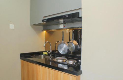 Cikarang Apartment | Wonderful 1BR Apartment at Mustika Golf Residence By Travelio