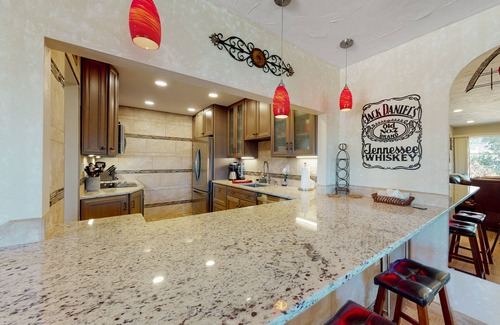 Carefree Condo | Wonderful condo with pool, fireplace, W/D, & grill - golf nearby