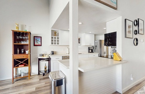 The Lakes Condo | Wonderful waterfront condo with pool, private balcony & fast WiFi - dog-friendly