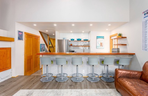 Alyeska Condo | Wonderfully located ski-in/out condo with wood fireplace, loft, mountain views