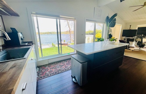 Woodbury Condo | WOODBURY'S LAKE QUASSEPAUG SPRING-FED LAKE. DIRECT WATERFRONT. BOAT DOCK.
