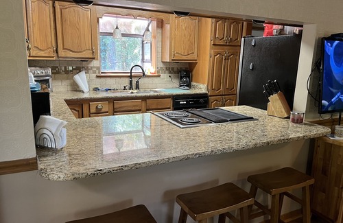 Greers Ferry House | Wooded Bliss on 1 acre with lake access across the street and sleeps up to 10!