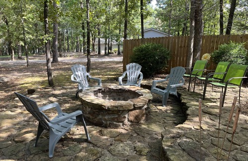 Greers Ferry House | Wooded Bliss on 1 acre with lake access across the street and sleeps up to 10!