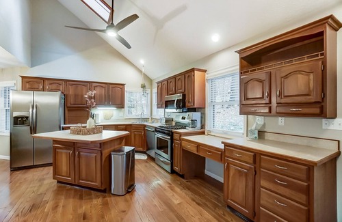 Howard House | Wooded, Lakefront home in Apple Valley