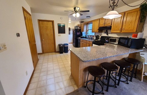 Paupack House | Wooded Retreat: 3 Bed/2 Bath, Hot Tub, A/C, Fire Pit, Ping Pong + Yard Games