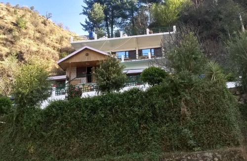 Kullu Cottage | Wooden Cottage in middle of an apple orchard