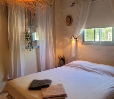 Dan House | wooden witch hut by the river