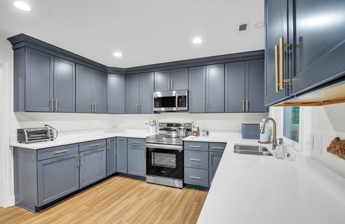 Orange House | Woodhaven: Your Serene Countryside Escape by RedAwning