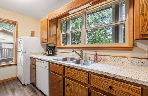 Kansas House | Woodland Escape, A rustic Charm meets Modern comfort in this 2BR 2BA home.