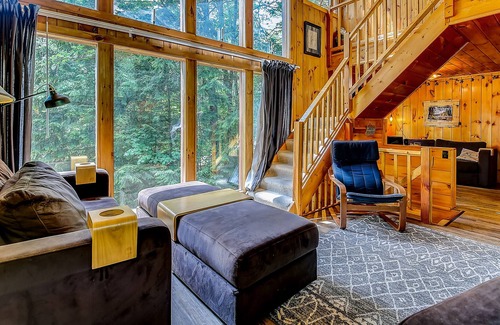 Eidelweiss Village House | Woodland lodge w/ firepit, deck, grill & fireplace - walk to beaches, dogs OK!