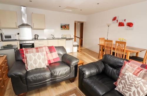 Ivegill Cottage | WOODPECKER, pet friendly, with open fire in High Head Castle Farm