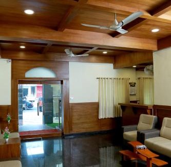 Thekkady Hotel | Woodside residency