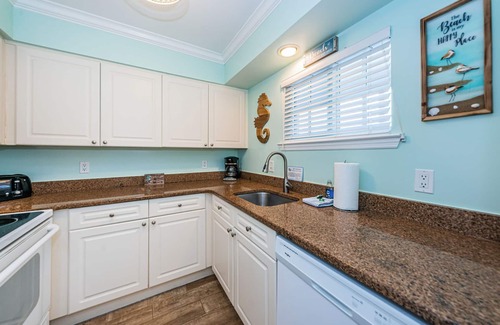 Indian Shores Condo | WOW! Beautifully Renovated Condo at Barefoot Beach Resort - Unit C203!