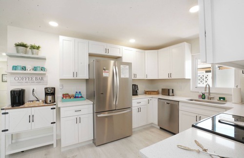 Indian Rocks Beach House | WTFR home heated pool, golf cart, kayaks, SUP