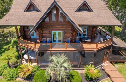 Manning House | Wyboo Lakefront Premier: Log Cabin on the Water!