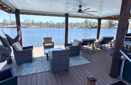Manning House | Wyboo Lakefront Premier: Log Cabin on the Water!