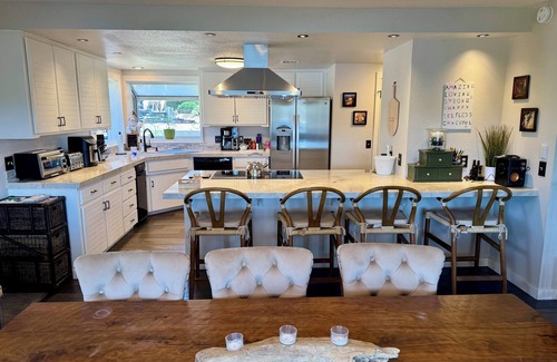 Oak Shores House | Xanadu Lakefront Retreat with covered private dock and slide in its own cove!