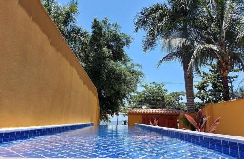 Jabaquara House | Yara - 4 suítes , Frente Praia, piscina em raia, Churrasqueira, Garagem, Wi-Fi