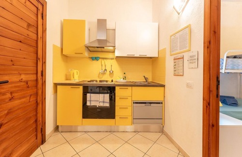 Santa Margherita di Pula Apartment | Yellow House with garden, 130 meters from the beach