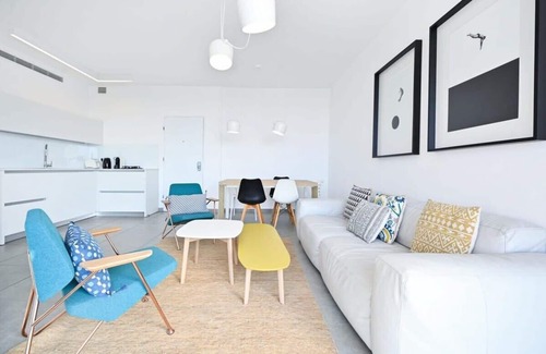 Jaffa Apartment | Yellow blue by HolyGuest