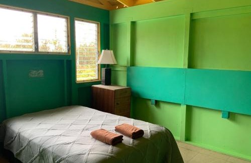 Mountain View Apartment | yellow house in tropical forest