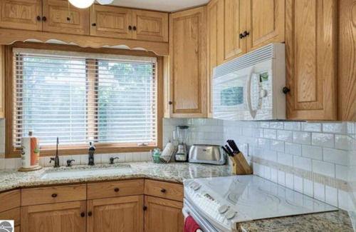 Traverse City House | Your Dream Family Getaway at a Lakehouse on Long Lake in Traverse City!