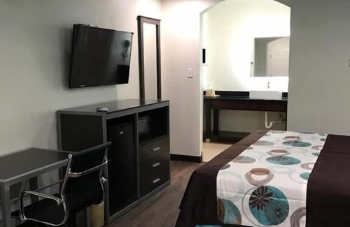 Spring Hotel | Your Home Away From Home! Close to Urban Air Trampoline and Adventure Park!
