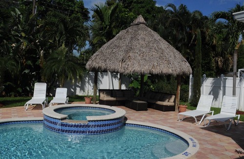Boca Raton House | YOUR HOME IN BOCA RATON with heated pool and Spa Private backyard and tiki hut