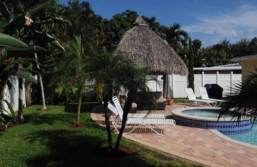 Boca Raton House | YOUR HOME IN BOCA RATON with heated pool and Spa Private backyard and tiki hut