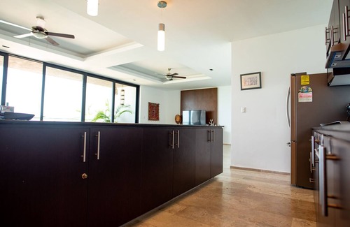 Chicxulub Puerto Apartment | Your home on the beach: beauty, comfort and tranquility!