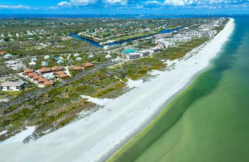 Sanibel House | Your Island Escape - Spacious Retreat with Wrap-Around Lanai and Private Beach