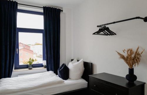 Wismar Apartment | Zwei Wohnungen, ein Erlebnis: Platz für 6 in 4 Schlafzimmern am Wismarer Hafen