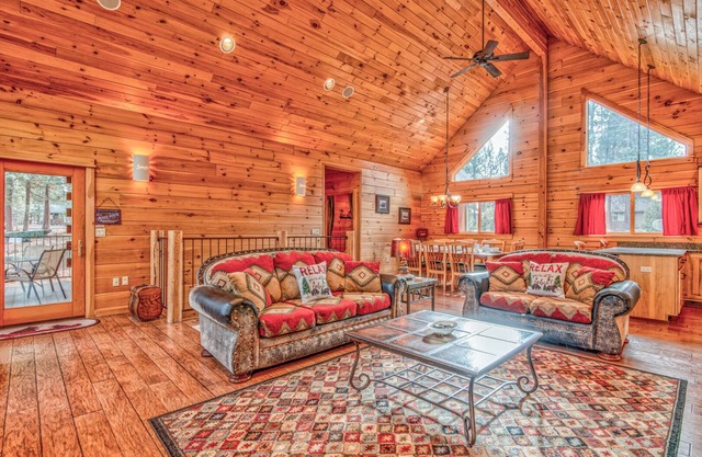 17166 Crane Drive is a custom built log cabin on the Big Deschutes River, wit