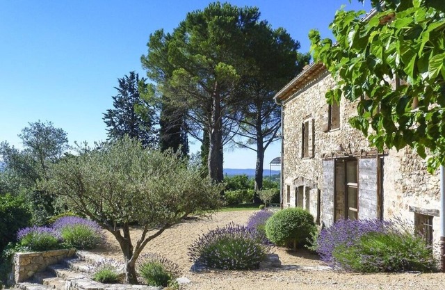 18th century restored stone house in a large mature garden with 360 degree views
