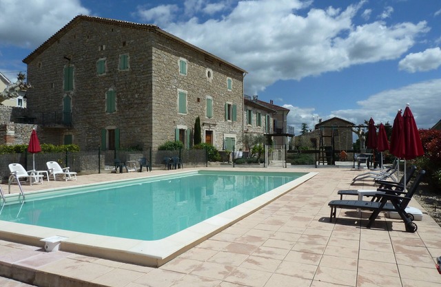 1st Floor apartment in19th century village house - shared pool , WiFi & Sat TV